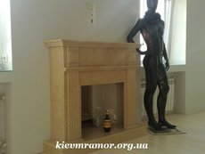 Камины из мрамора. Электрокамин с облицовкой.
