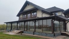 Остекление террасы раздвижной системой Reynaers